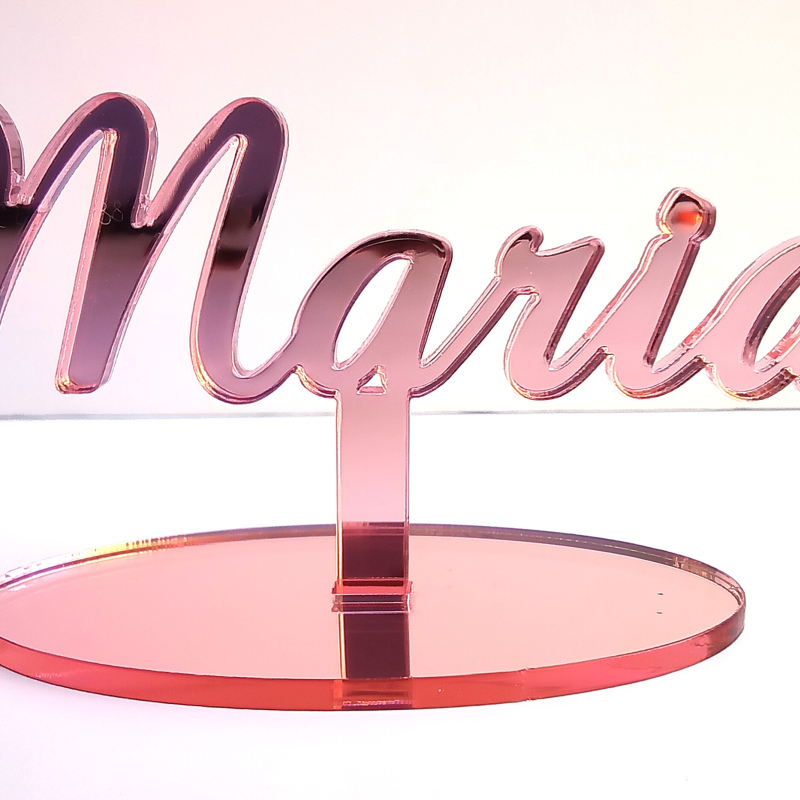 Acrylic laser cut name on a stand